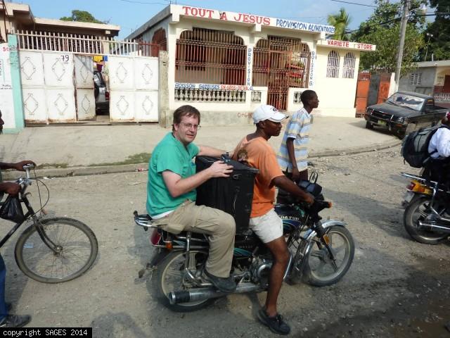 Motorcycle taxi to clinic Haiti January 2010