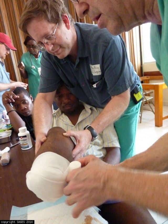 Treating amputation wound Haiti January 2010